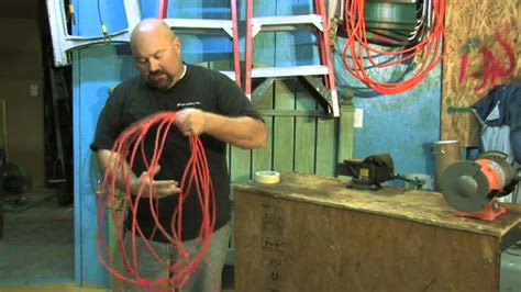 how to coil up electrical cord around a box|over under extension cord.